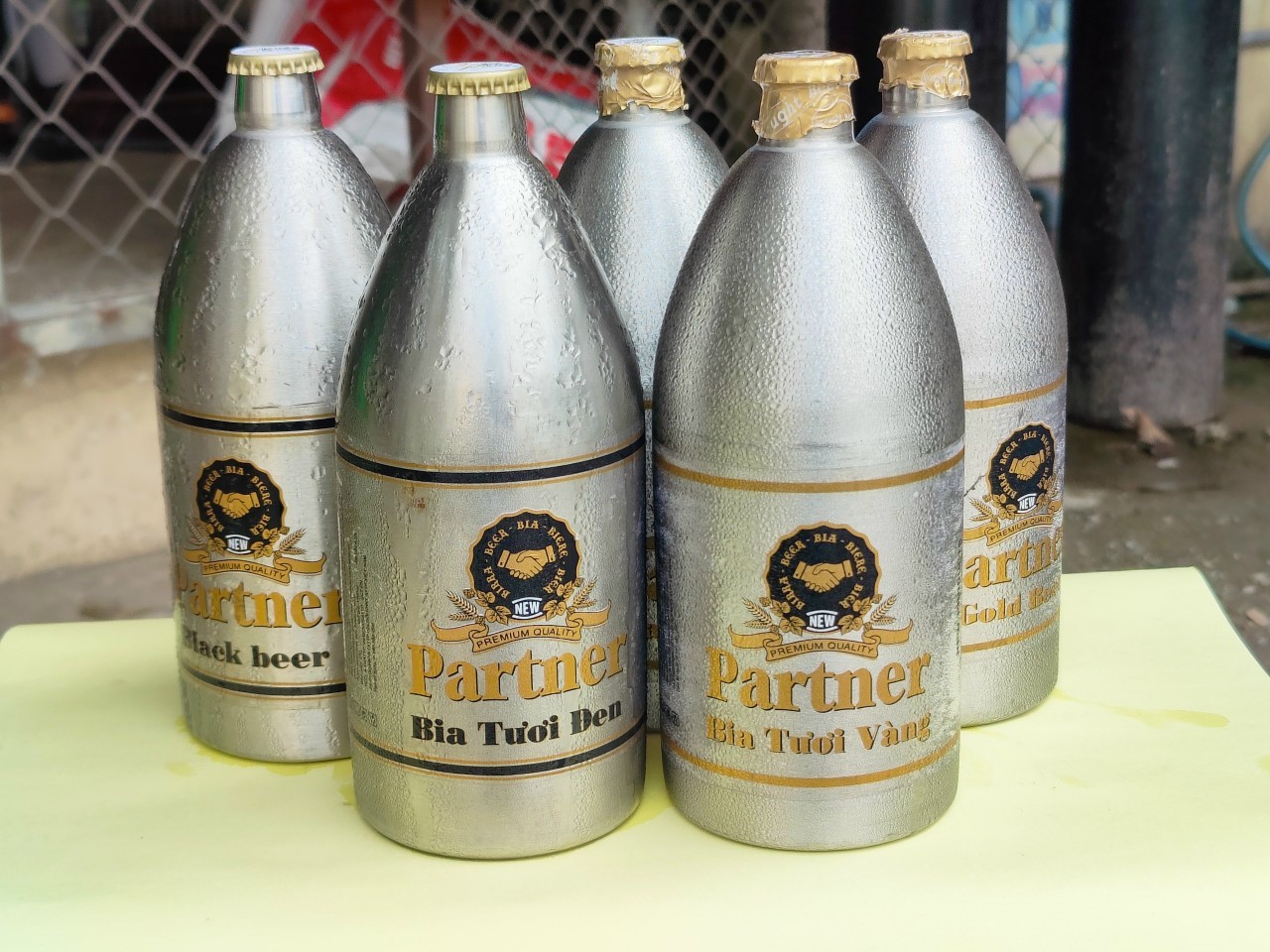 quy trình sản xuất và đóng nắp chai tự động bia tươi keg inox